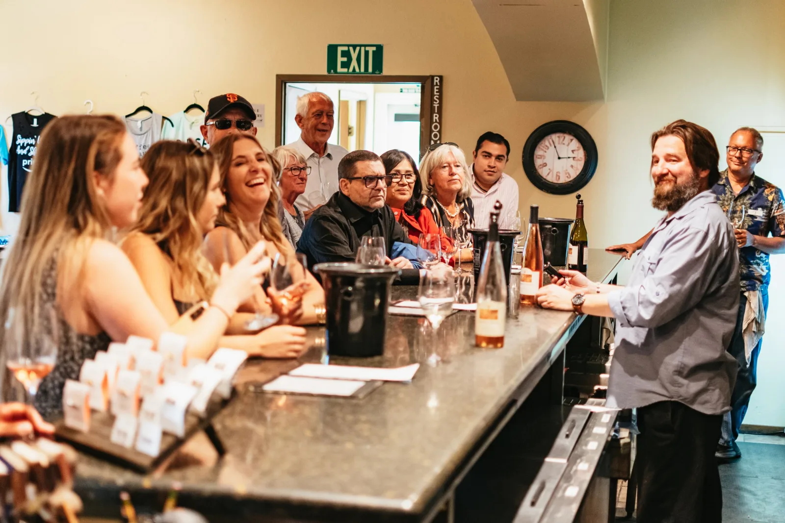 Tour group seated together during a guided wine tasting