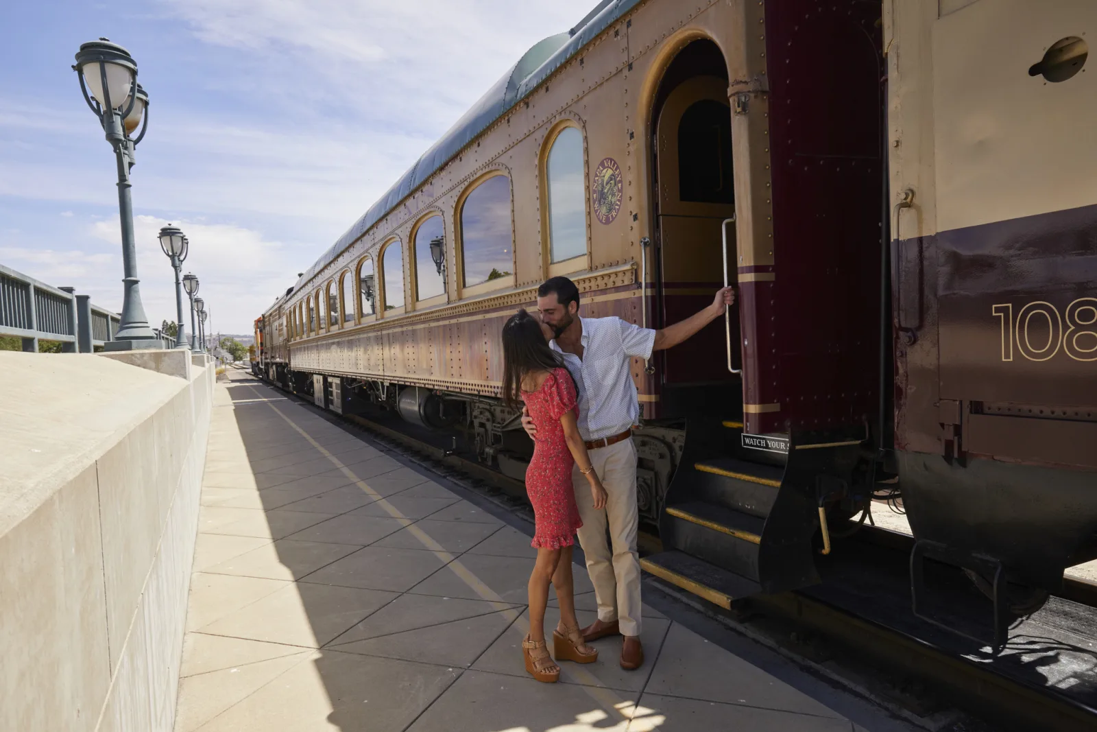 Couple boarding a restored Napa Valley Wine Train passenger car